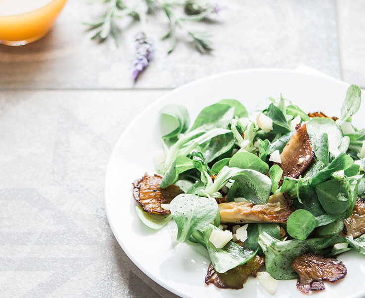 Plate of Pork Chops with Mixed Greens