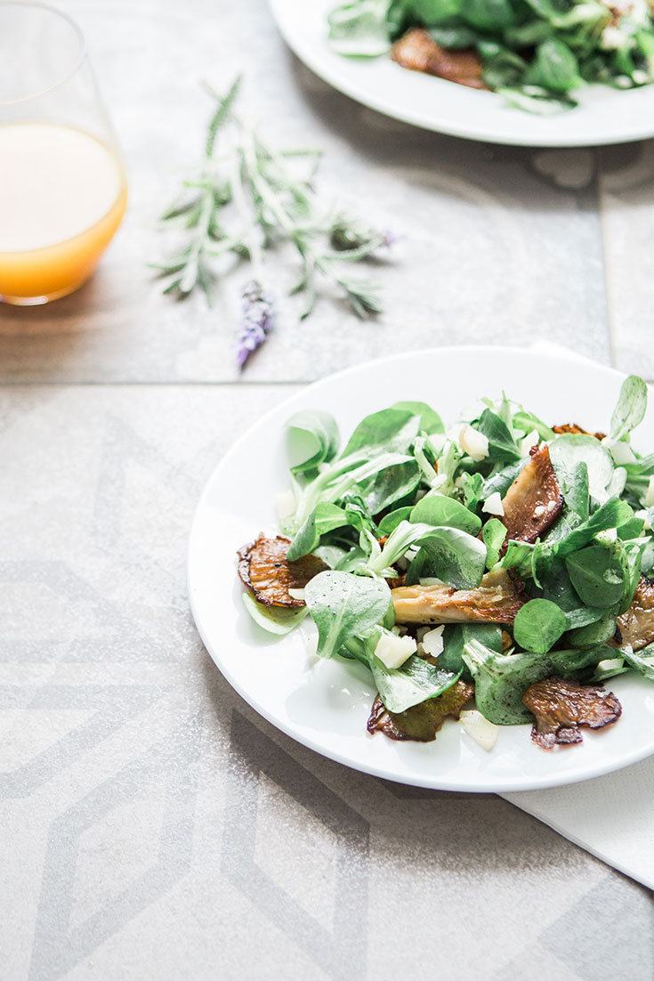 Plate of Pork Chops with Mixed Greens